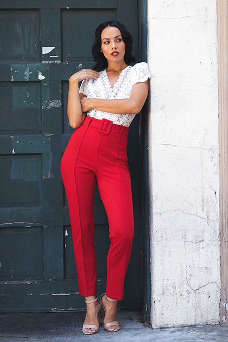 Red women's pants with a belt with a buckle, chic style for outings