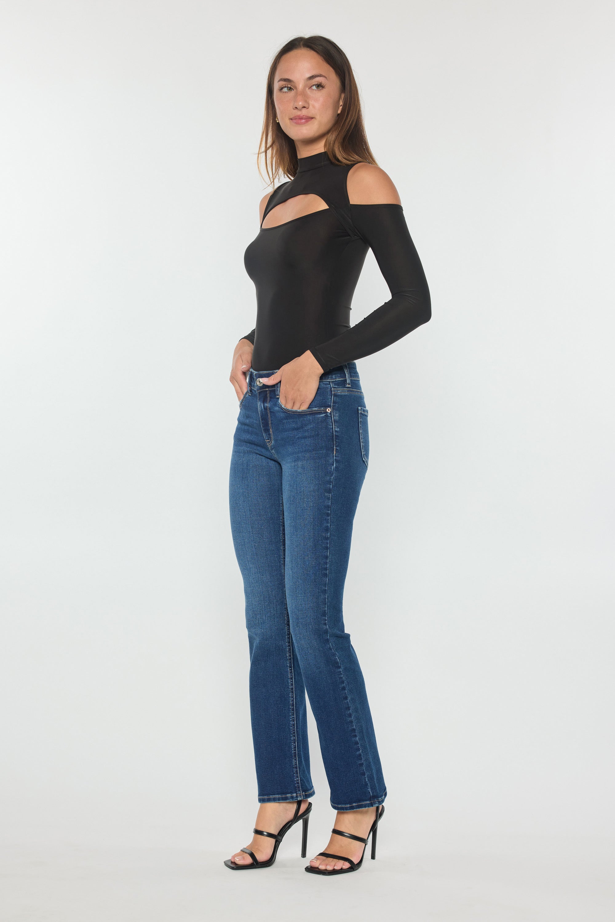 Women's blue bootcut jeans, perfect for pairing with boots
