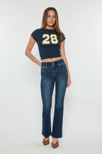 Women's bootcut jeans in dark wash, perfect for wearing with boots