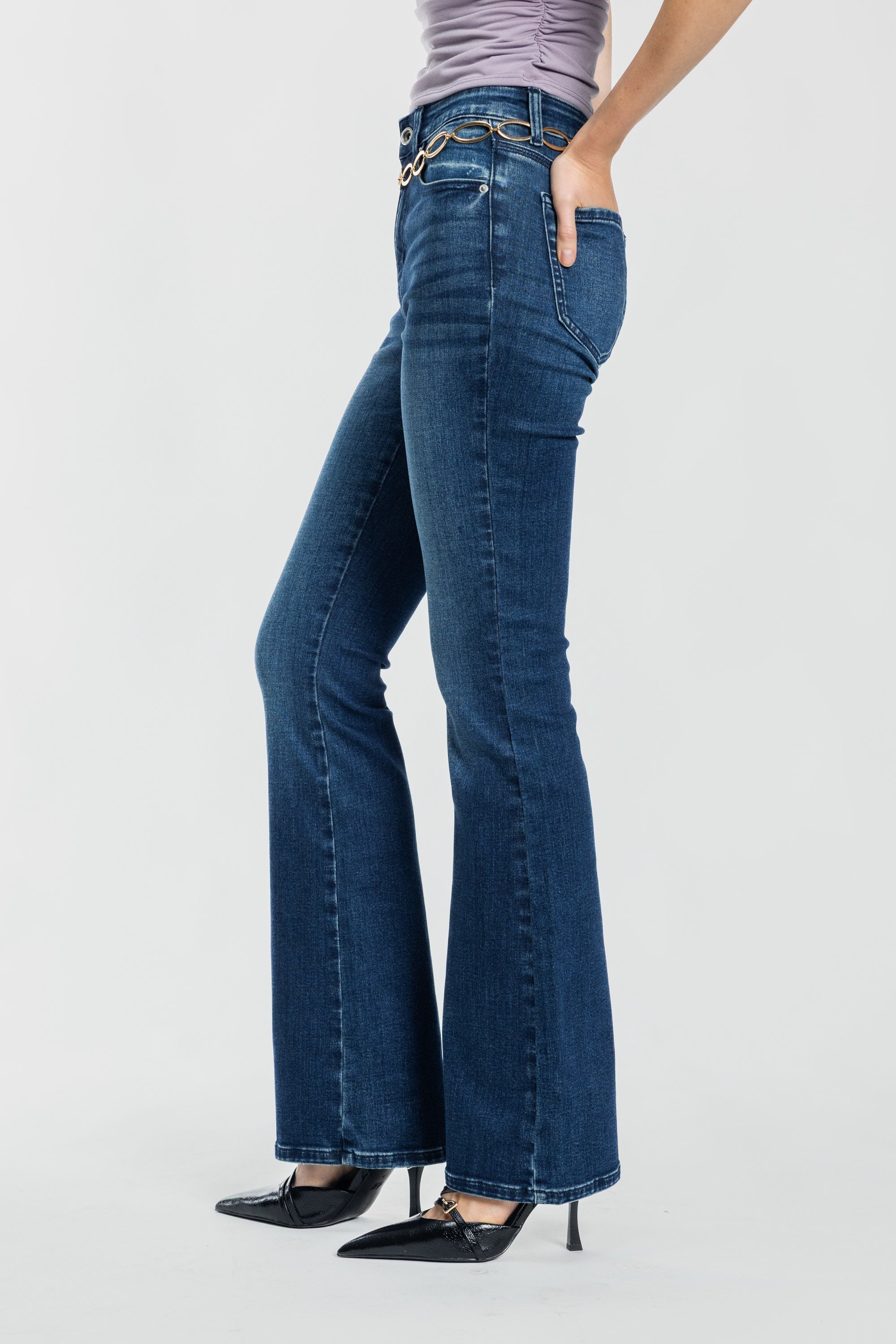 Women's bootcut jeans in dark wash, perfect for pairing with boots