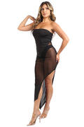 Woman wearing a black strapless dress with sheer panels on a white background