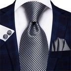 Stylish designer wedding ties for men featuring a textured pattern, paired with matching cufflinks and pocket square