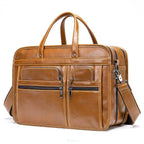 Genuine leather business briefcase in tan with multiple zippered pockets for organized storage