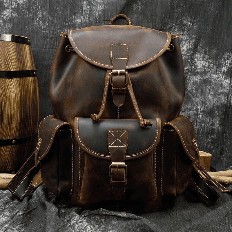 Handcrafted leather backpacks men women in dark brown with multiple pockets and vintage design