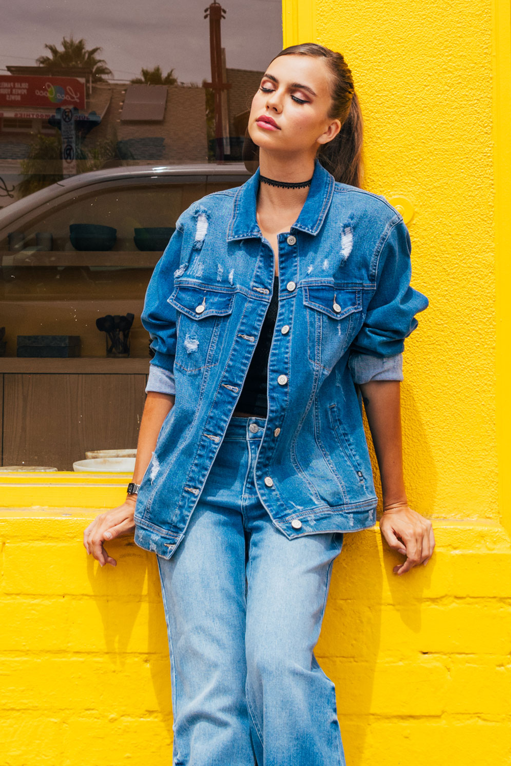 Women's distressed denim jacket for casual outings