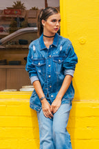 Women's distressed denim jacket for casual street style