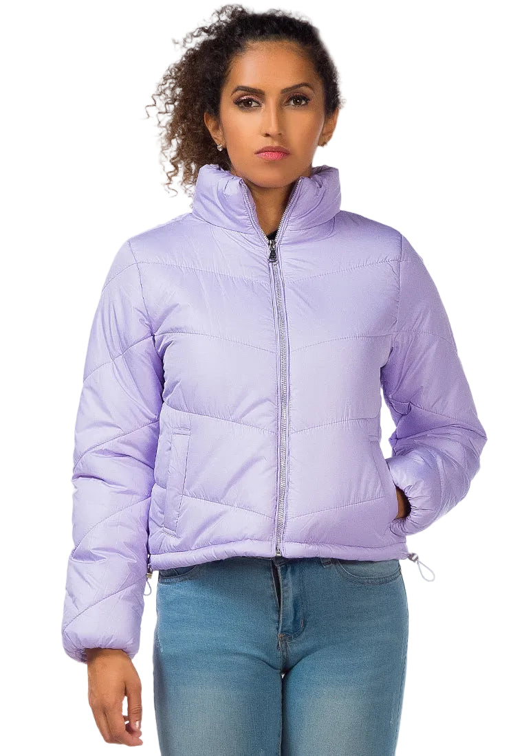 Woman wearing a light purple puffer jacket on a white background