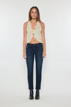Women's mid rise jeans in dark blue denim, perfect for casual outings