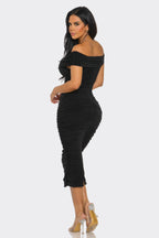 Black off-shoulder dress made of soft fabric, perfect for evening wear