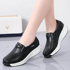 Women's black orthopedic shoes with slip-on design for all-day comfort