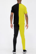 Men's color-block track pants in black and yellow, perfect for casual wear