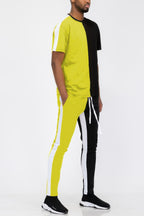 Men's black and yellow track pants, stylish activewear for casual outings
