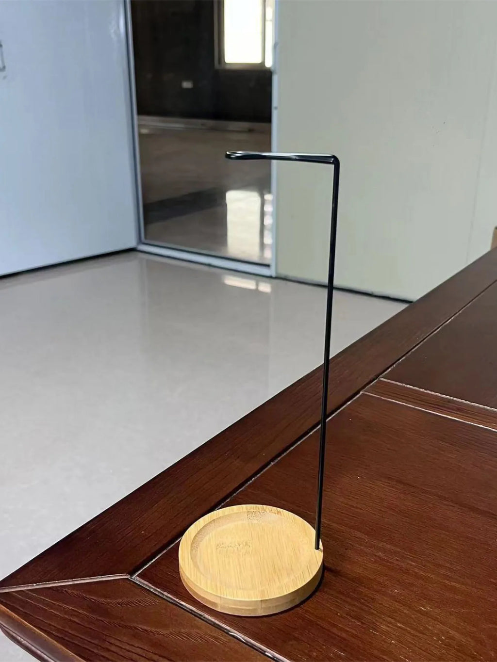 Upside down incense burner with a bamboo base for aromatic enjoyment