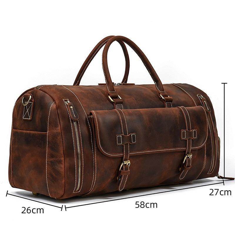 Vintage leather travel duffle bag in brown with multiple pockets and sturdy handles