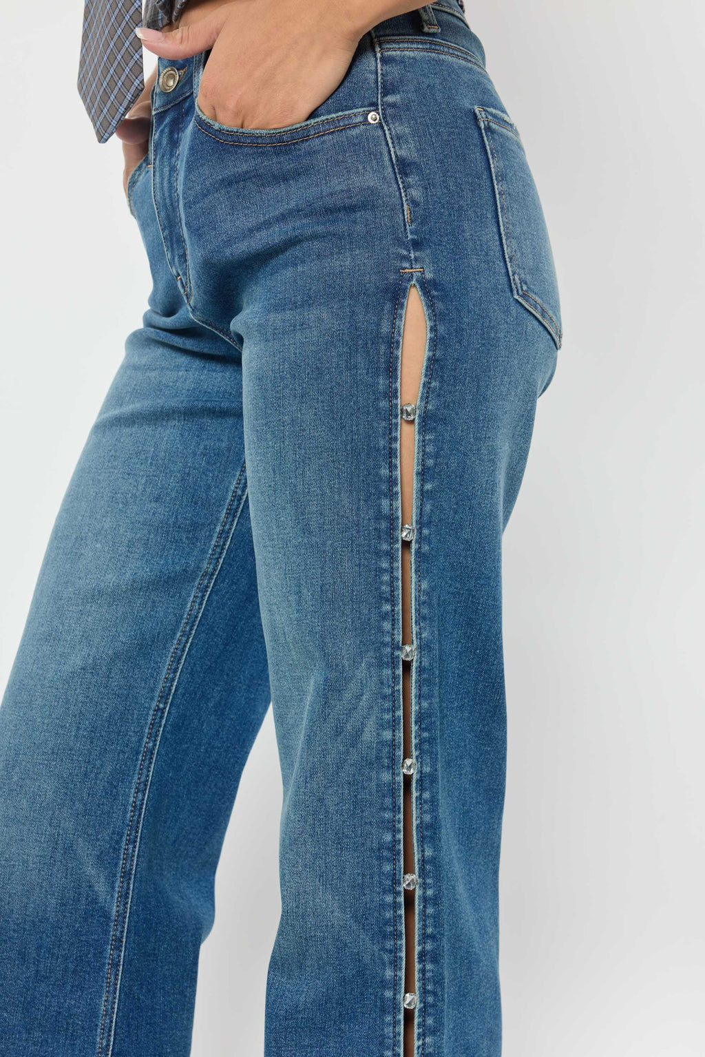 Women's blue wide-leg jeans with side button detail for casual wear