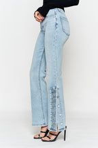Women's light wash wide-leg jeans with button details, stylish fit