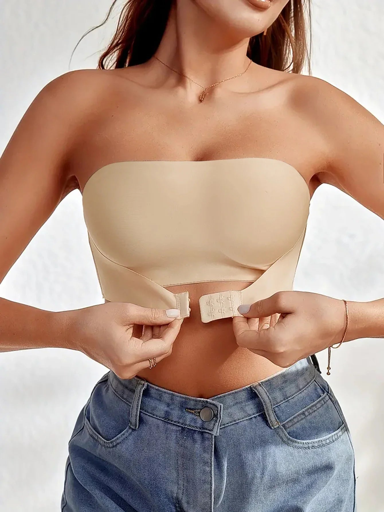 Women's strapless seamless bra in nude, perfect under summer outfits